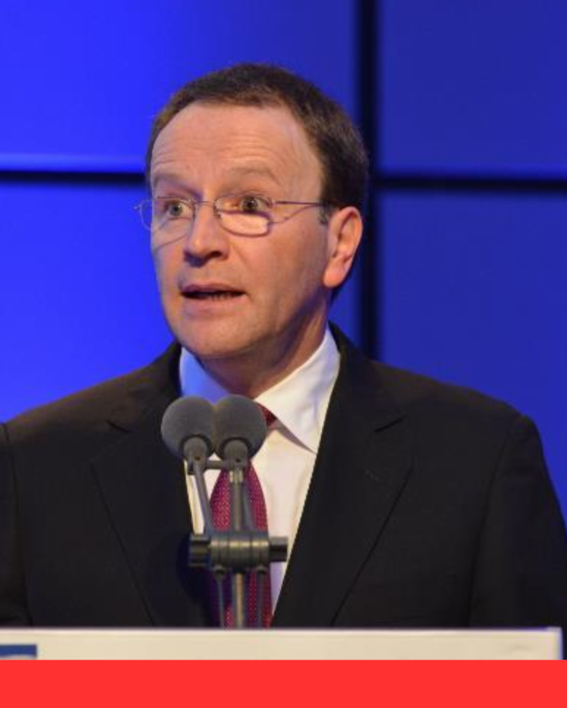 John Paulson and Ulf Mark Schneider